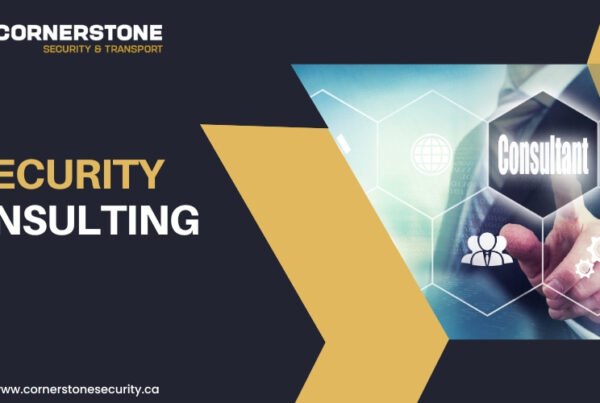 Cornerstone Security branded graphic that says Security Consulting with an image of a man in a suit posting at a screen that says consultant